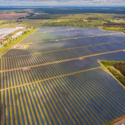 solar-power-plant-in-the-field-aerial-view-of-solar-panels